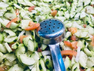 Cucumber salad, which is one of the customer's favorites